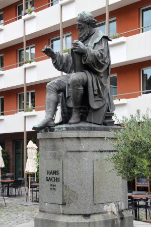 Photo for Nuremberg, Germany - August 27, 2023: Monument to Hans Sachs, a German shoemaker, poet, mastersinger and dramatist of the 16th century. Statue by Johann Krausser, 1874. - Royalty Free Image