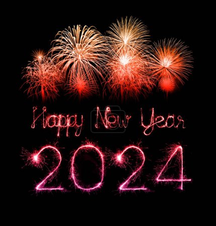 Foto de 2024 feliz año nuevo fuegos artificiales celebración escrito chispeante en la noche - Imagen libre de derechos