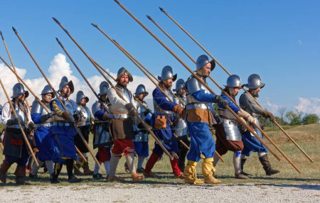 Photo for PALMANOVA, Italy - September 4, 2022: Reenactors parading after the battle during the Seventeenth Century annual historical reenactment - Royalty Free Image
