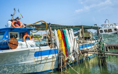 Fishing floats and nets colored yellow and red called pots ideal for lake fishing of Lesina and Varano, Apulia. Italy 