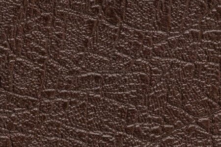 Photo for Brown artificial or synthetic leather background with neat texture and copy space, colorful fabric sample with leather-like finish aimed for upholstery, fashion, sewing or footwear projects - Royalty Free Image