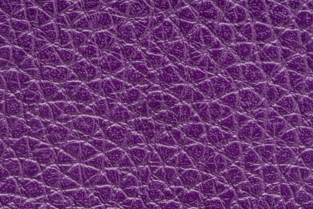 Photo for Purple artificial or synthetic leather background with neat texture and copy space, colorful fabric sample with leather-like finish aimed for upholstery, fashion, sewing or footwear projects - Royalty Free Image