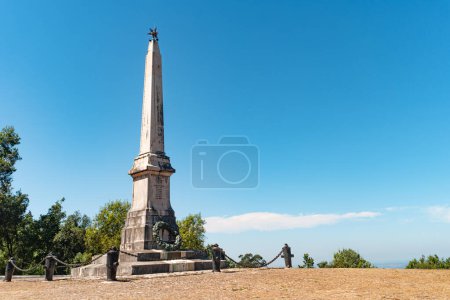Photo for View of monument commemorating war soldiers, mountains on background, in Bucaco, Portuga - Royalty Free Image