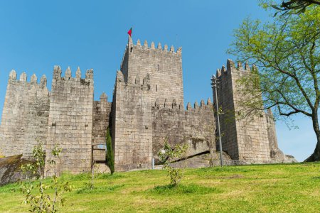 Medieval castle of Guimaraes was built in 10th century. The main flanking towers at the main gate were built at the end of the 13th century