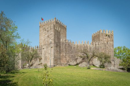 Medieval castle of Guimaraes was built in 10th century. The main flanking towers at the main gate were built at the end of the 13th century