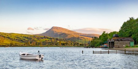 Photo for Bala Lake, Llyn Tegid, in North Wales, on a fine spring evening. Looking towards the Aran mountains. - Royalty Free Image