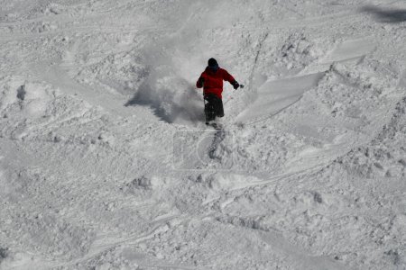Photo for Freeride skier skiing downhill trough fresh snow powder. - Royalty Free Image