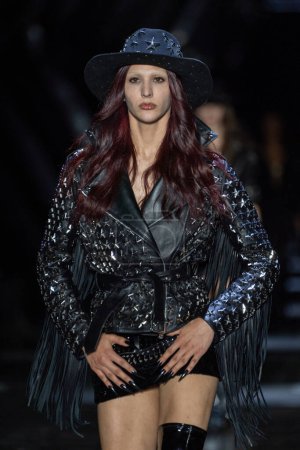 Photo for MILAN, ITALY - FEBRUARY 25: A model walks the runway at the Philipp Plein fashion show during the Milan Fashion Week Womenswear Fall/Winter 2023/2024 on February 25, 2023 in Milan, Italy. - Royalty Free Image