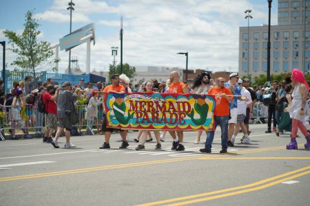 Photo for NEW YORK - JUNE 18, 2022: Participants marching during the 40th Annual Mermaid Parade at Coney Island, the largest parade in the nation and a celebration of ancient mythology on June 18, 2022 in Brooklyn NY. - Royalty Free Image