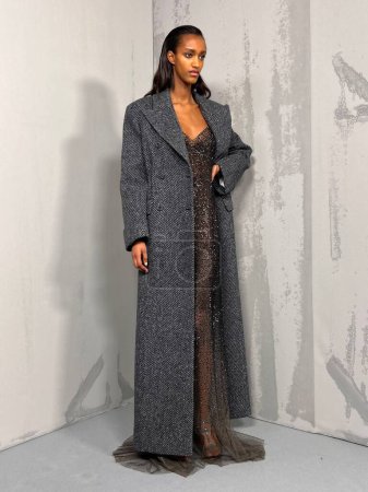 Photo for MILAN, ITALY - FEBRUARY 25: A model posing before the Ermanno Scervino fashion show during the Milan Fashion Week Womenswear Fall Winter 2023 2024 on February 25, 2023 in Milan, Italy. - Royalty Free Image