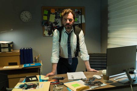 Focused investigator stands behind his desk, surrounded by case files and clues, embodying determination