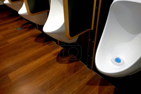 Photo for View of the urinals in the men's toilet in a cafe or restaurant - Royalty Free Image
