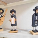 Krakow, Poland, August 15, 2022: close-up on wooden figurines of Jews