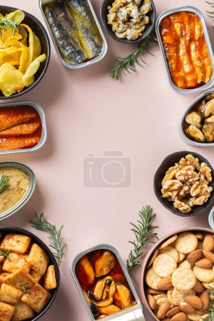 Photo for Assortment of different canned preserved fish and seafood in tin cans ready for tinned fish date night. Cheap and lowbrow food during economic crisis and inflation, copy space - Royalty Free Image