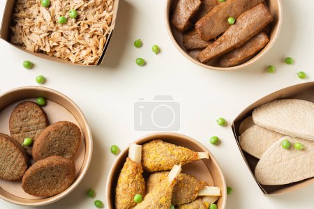 Photo for Assortment of plant based meat on a table. Food to reduce carbon footprint, sustainable consumption. View from above, flat lay food. - Royalty Free Image