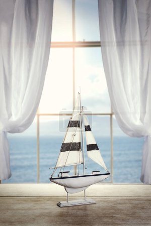 Foto de Barco de sailling de juguete en ventana - Imagen libre de derechos