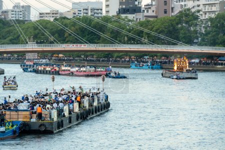 Photo for Osaka, Japan - July 25 2023 : Tenjin Matsuri Festival. Festival boats along Okawa River. - Royalty Free Image