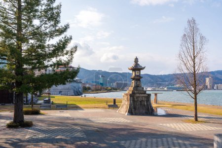 Ishiba tsu night light monument, on the shore of Lake Biwa. Otsu, Shiga Prefecture, Japan. Japanese translation "night light".