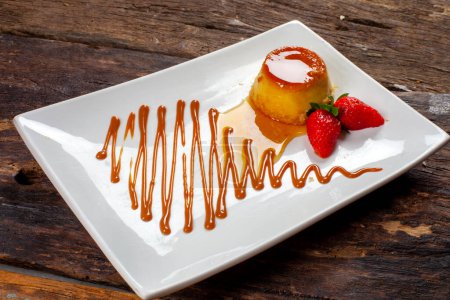 Photo for Pudding dessert with strawberries - Royalty Free Image