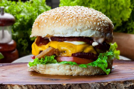 Photo for Delicious hamburger with meat bun and vegetables - Royalty Free Image