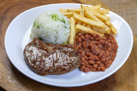 Photo for Rice, beans, french fries and meat - Royalty Free Image