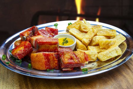 Photo for Pork ribs with fried cassava - Royalty Free Image