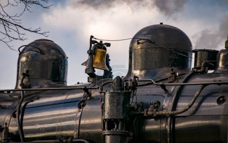 Foto de A Close Up View of an Antique Steam Engines Bell and Compressor - Imagen libre de derechos