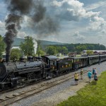 Rockhill Furnace, Pennsylvania, August 5, 2023 - An Aerial View of a Narrow Gauge Steam Passenger Train, Getting Ready To Leave the Station, Blowing Smoke, on a Sunny Summer Day