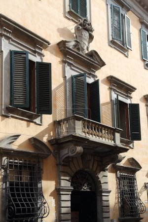 Photo for Balcony and window shutters in Pisa, Tuscany, Italy - Royalty Free Image