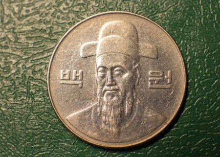 Photo for Reverse of the coin 100 Korean won on a dark background. - Royalty Free Image