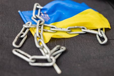 Chain on the flag of Ukraine. Ban on citizens leaving the country
