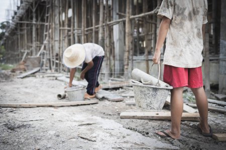 Photo for Child labor concept. Children working at construction site, Poor children, poverty. - Royalty Free Image