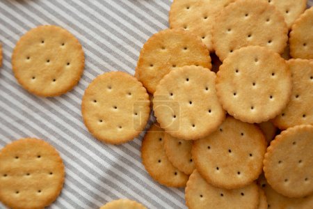 Photo for Round Crispy Crackers with Sea Salt, top view. - Royalty Free Image