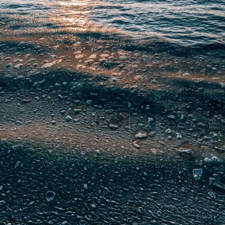 Photo for Close-up of snow and ice on surface of Baltic sea at winter. Beautiful nature. Sunset light. - Royalty Free Image