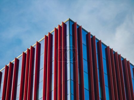 Photo for Building corner. Modern architecture. Blue sky on the background. Close-up. - Royalty Free Image