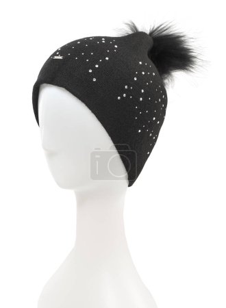 Photo for Stylish black hat with pompom on a mannequin on white background - Royalty Free Image