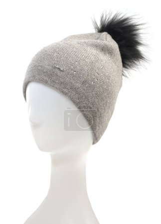 Photo for Stylish grey hat with pompom on a mannequin on white background - Royalty Free Image