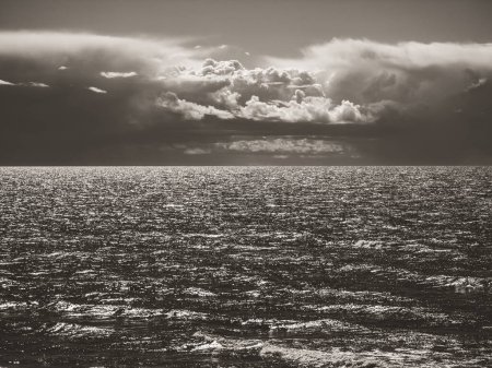 Photo for Beautiful seascape. Cloudy sky. Reflection of sunlight on sea waves - Royalty Free Image