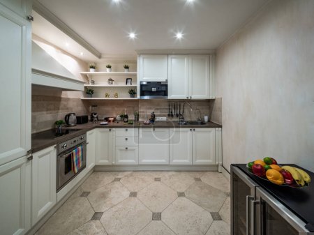 Photo for Modern interior of private house. Spacious kitchen. Fresh fruits - Royalty Free Image