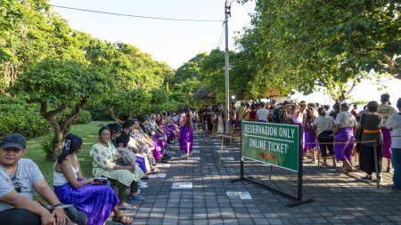 Photo for BALI APRIL 2024  Long waiting to enter the Arena inside the of UluwatuTemple for the KecakDance, Bali, Indonesia - Royalty Free Image