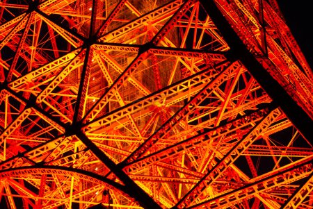 Photo for TOKYO, JAPAN  APRIL 2024  Spectacular perspective view of Tokyo Tower illuminated at night. The Tokyo Tower is a telecommunications building and also a panoramic observatory located in Minato district, Tokyo, Japan. - Royalty Free Image