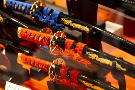 Photo for Japan, April 2024 : Samurai sword the art of weapons from ancient Japan, katana, for sale in a shop at Nakamise Dori in Sensoji shrine. Sensoji temple at Japan. - Royalty Free Image