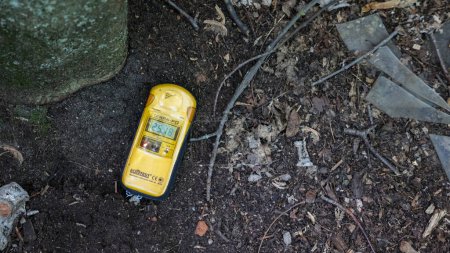 Photo for Exclusion Zone. Ukraine. Pripyat. August 26, 2019. Dosimeter with increased number of radiation. Chernobyl nuclear power plant - Royalty Free Image