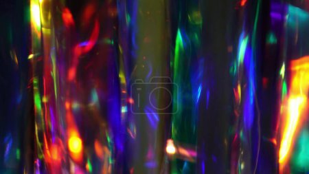 Photo for A diamond sparkling with different rainbow neon colors on a dark background. Prism Light Flares Overlay on Black Background. High quality photo - Royalty Free Image