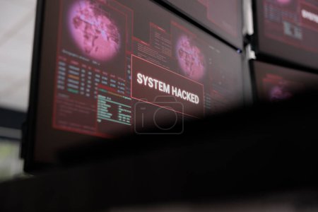 Photo for Web developer computer showing cyber crime attack on monitor with security breach, error message flashing on screen. Dealing with hacking attack alert and pc malfunction, system error. Close up. - Royalty Free Image