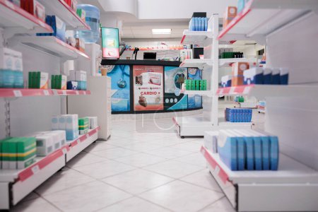 Photo for Empty health care facility shelves filled with vitamins and medicaments boxes, retail store with pharmaceutical products. Pharmacy space equipped with medical drugs and pills, supplement bottles. - Royalty Free Image