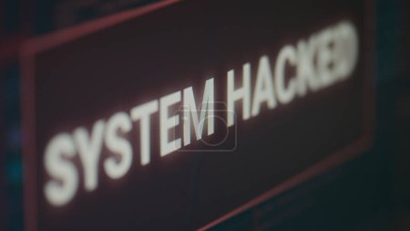Photo for Computer display with hacking alert and system crash, showing cyber crime attack with error distortion message flashing on screen. Monitor displaying security breach malfunction. Close up. - Royalty Free Image