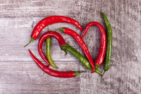 Photo for Colored peppers on wooden background. Healthy food - Royalty Free Image