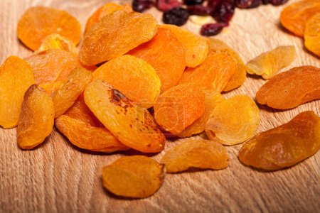 Photo for Dried fruits on wooden background in studio photo - Royalty Free Image