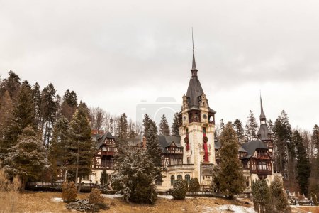 Photo for Beautiful view of Peles castle from Sinaia in winter. Romania. Mediaval castle - Royalty Free Image